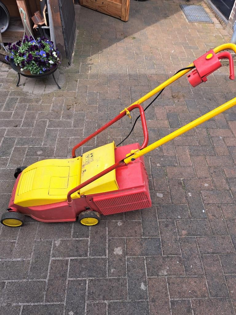 Grasmaaier rood/geel wolfgarten, Ophalen