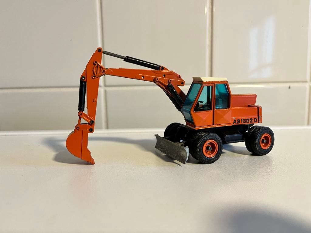 Atlas AB1302 D Graafmachine Model - Oranje, Hobby en Vrije tijd, Modelauto's | 1:50, Ophalen of Verzenden, Gebruikt, Overige typen