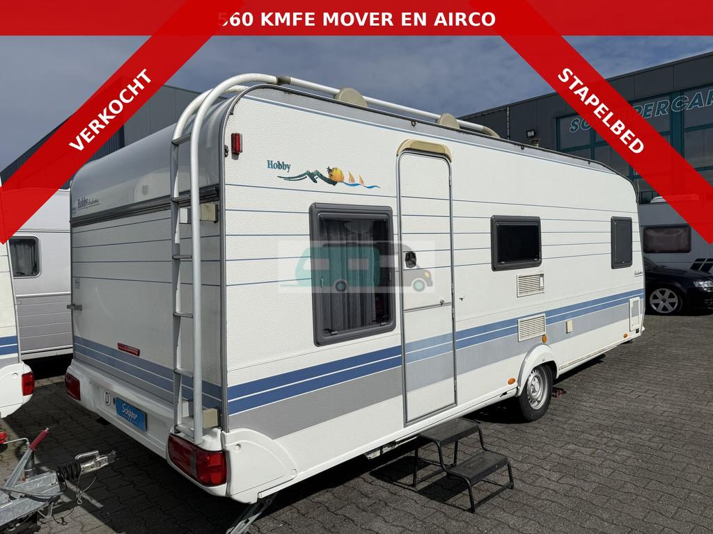 Hobby exclusive 560 KMFE Stapelbed (bj 2000), Caravans en Kamperen, Caravans, Hobby, Schokbreker, Bedrijf, Tot en met 6