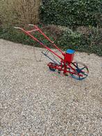 Handzaaimachine, Ophalen