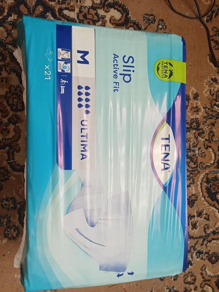 Te koop tena ultima medium 21 stuks per pak zie beschrijving, Diversen, Ophalen of Verzenden