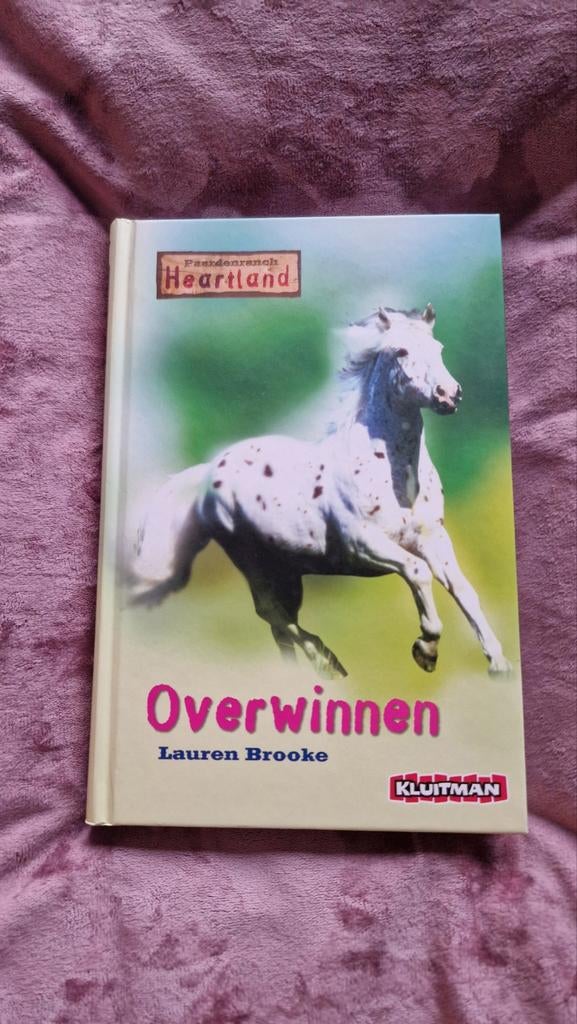 Boek Paardenranch Heartland: Overwinnen, Ophalen of Verzenden, Gelezen, Lauren Brooke