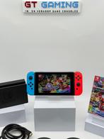 NINTENDO SWITCH NIEUW MODEL 2023 V2 MARIO KART+STUURTJES, Spelcomputers en Games, Spelcomputers | Nintendo Switch, Met 2 controllers