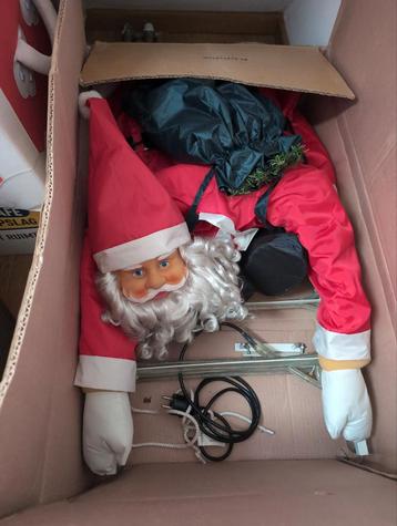 Kerstman op ijzeren verlichte ladder  beschikbaar voor biedingen