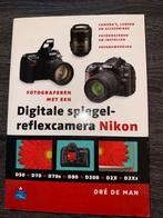 Digitale Spiegelreflexcamera Nikon - Dré de Man, Ophalen of Verzenden, Gelezen, Hardware