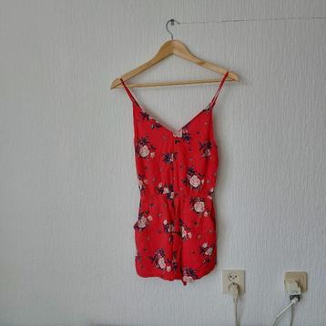 H&M rood jumpsuit met bloemenprint maat 38