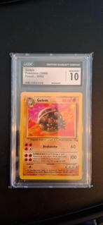 Mint‑staat CGC 10 – Pokémon Fossil Golem #36 (Engels), Ophalen of Verzenden, Nieuw, Losse kaart