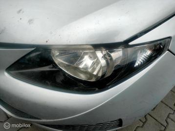 Koplamp links Seat Ibiza 6J ('08-'17) beschikbaar voor biedingen