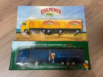 2 vrachtauto schaalmodellen met bierreclame. Palm Gulpener beschikbaar voor biedingen