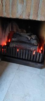 Leuk blok hout met verlichting, Huis en Inrichting, Haarden, Ophalen of Verzenden, Zo goed als nieuw, Vrijstaande haard, Houthaard