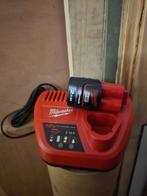 Milwaukee M12 Accu + Oplader nieuw, Doe-het-zelf en Verbouw, Gereedschap | Machine-onderdelen en Toebehoren, Ophalen of Verzenden