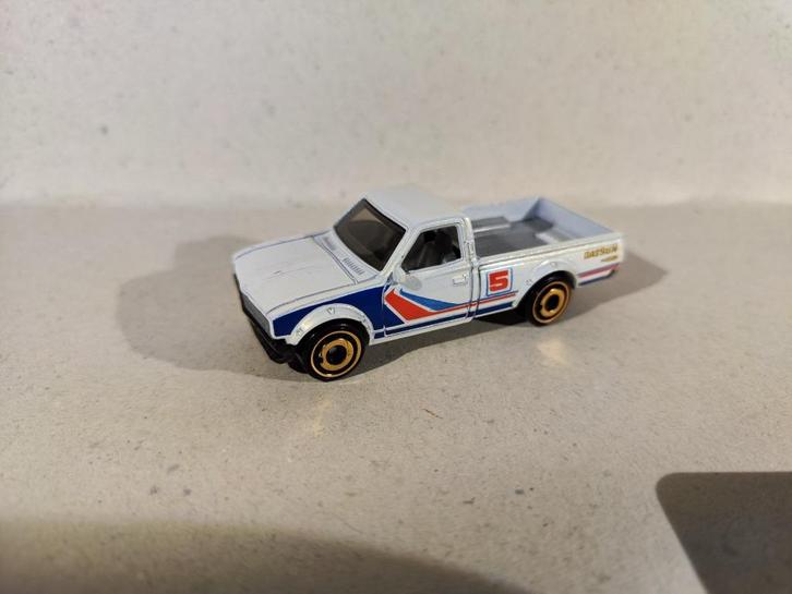 Hot Wheels Datsun 620, Hobby en Vrije tijd, Modelauto's | Overige schalen, Zo goed als nieuw, Auto, Ophalen of Verzenden