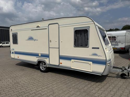Adria Unica 502 UP bouwjaar 2003 met voortent, Caravans en Kamperen, Caravans, Bedrijf, tot en met 4, 750 - 1000 kg, Rondzit, Adria