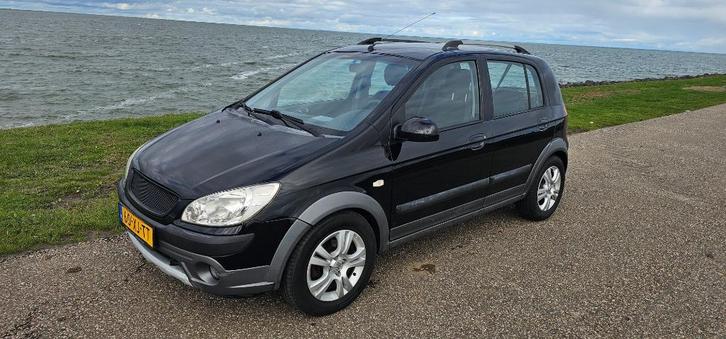 Hyundai Getz Cross 1.4 5DRS 2007 Zwart, Auto's, Hyundai, Particulier, Getz, ABS, Airbags, Airconditioning, Bluetooth, Centrale vergrendeling