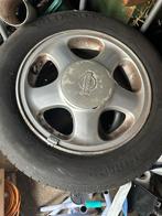 Nissan wielen 14 inch, Ophalen
