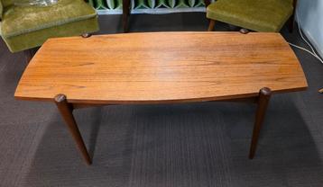 Vintage teakhouten salontafel met omkeerbaar formica blad beschikbaar voor biedingen