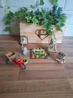 Sylvanian familie moestuin met twee poppetjes en een fiets., Ophalen of Verzenden
