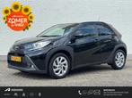 Toyota Aygo X 1.0 VVT-i MT first / Afn. Trekhaak / Camera /, Auto's, Stof, Gebruikt, Euro 6, 920 kg