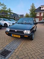 Nissan Micra K10 1.2 automaat 1988 blauw, Auto's, 4 cilinders, Blauw, Micra, Grijs