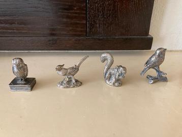 4 zilver miniaturen beschikbaar voor biedingen