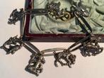 VINTAGE SCHAKEL ARMBAND MET BEDELS VAN STERRENBEELDEN, Ophalen of Verzenden, Overige materialen, Armband