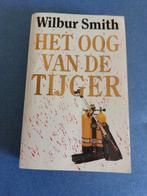 Wilbur Smith - Het oog van de tijger, Boeken, Ophalen of Verzenden, Zo goed als nieuw, Wilbur Smith, Nederland