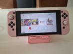 Roze Nintendo Switch met tasje en standaard, Spelcomputers en Games, Games | Nintendo Switch, Gebruikt, Overige genres, 1 speler