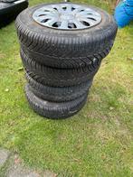 Continental Winterbanden met Ford wieldop - Set van 4, Ophalen, Gebruikt, 15 inch, Banden en Velgen