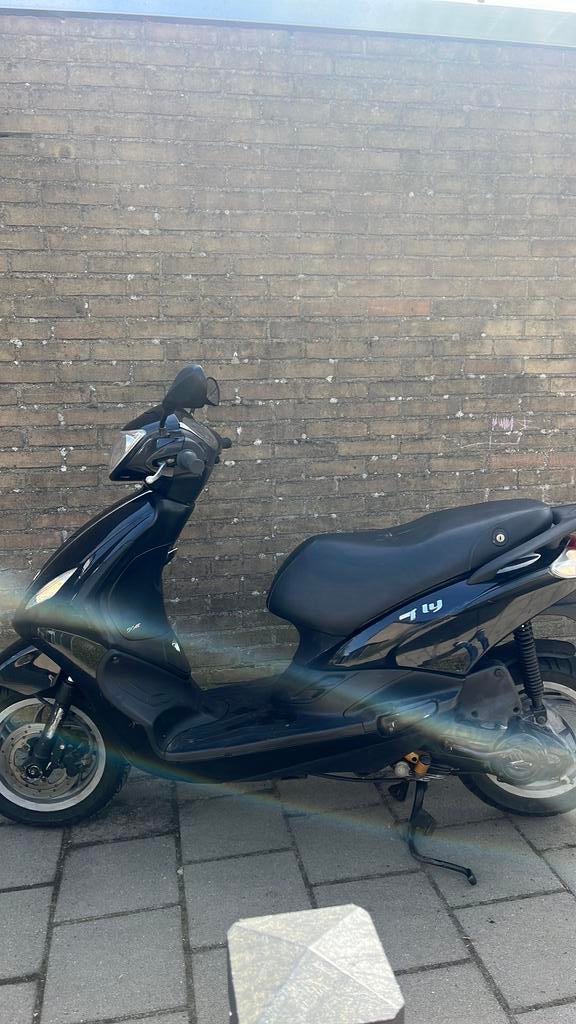 Piaggio New Fly 2013 gele plaat, Fietsen en Brommers, Scooters | Piaggio, Ophalen, Maximaal 45 km/u, 72 cc, Zo goed als nieuw