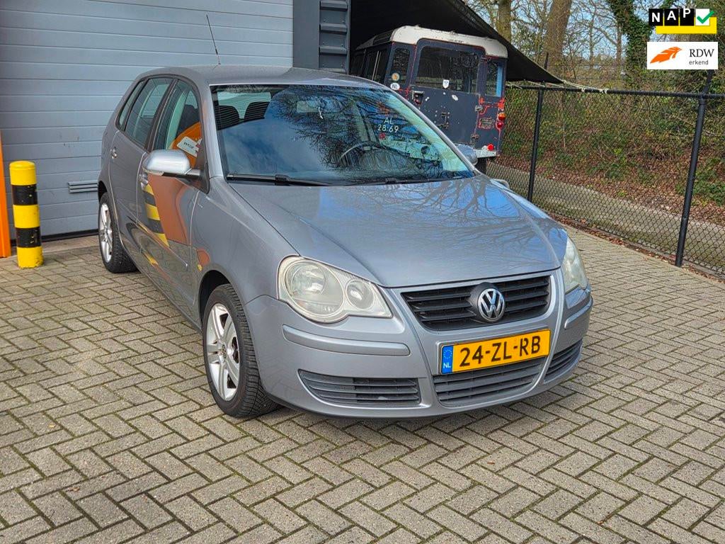 Volkswagen Polo 1.4-16V Optive, Auto's, Voorwielaandrijving, Stof, Zwart, 4 cilinders