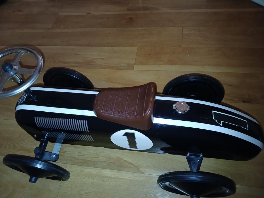 Mooie metalen loopauto, Ophalen