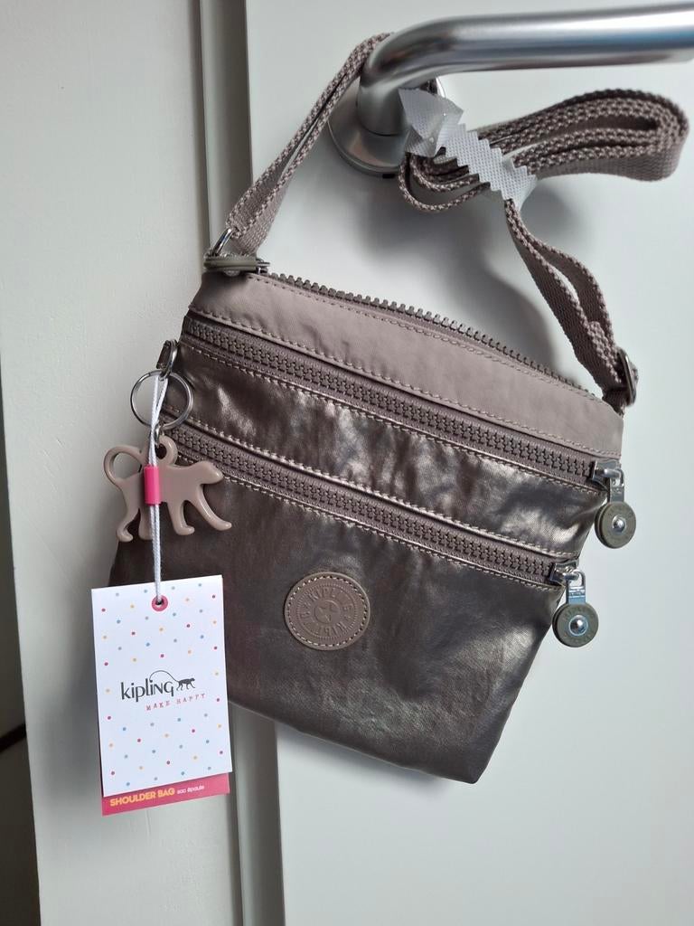Nieuw Kipling tasje, metallic kleur., Ophalen of Verzenden, Nieuw, Beige, Schoudertasje