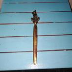 Antieke briefopener met zittende kat, Ophalen