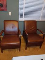 2 lederen bruine fauteuils met RVS poten ., Huis en Inrichting, Fauteuils, Minder dan 75 cm, Leer, Zo goed als nieuw, 50 tot 75 cm