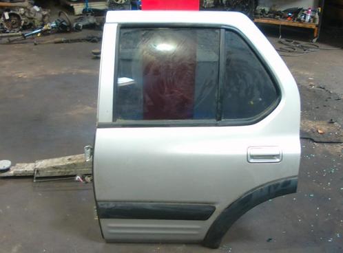 Portier Links Achter Opel Frontera (6B) (1998-10/2004-07), Auto-onderdelen, Carrosserie en Plaatwerk, Opel, Gebruikt