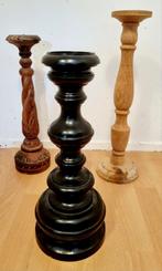 3 kandelaars van hout, Ophalen