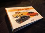 Dinky toys klapper met info en certificaten, Hobby en Vrije tijd, Modelauto's | 1:43, Ophalen of Verzenden, Zo goed als nieuw