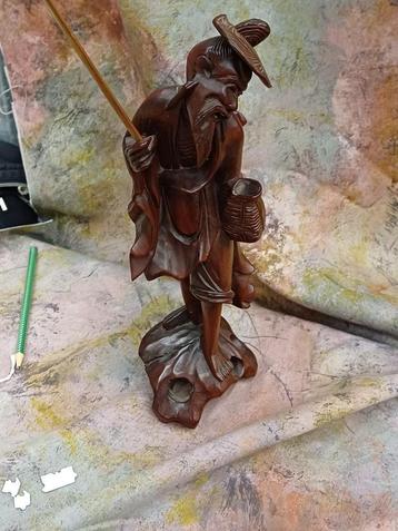 Mooi houten beeldje beschikbaar voor biedingen