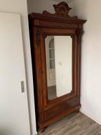 Antieke kast met spiegel en slot, Ophalen