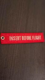 Sleutelhanger voor motor rood "insert before flight", Verzamelen, Sleutelhangers, Ophalen of Verzenden, Nieuw, Merk