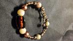 Mooie spiraal armband. Past altijd., Ophalen of Verzenden, Nieuw, Bruin, Overige materialen