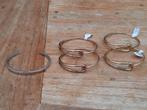 Melano Twisted armbanden maat M (15 euro per stuk), Verzenden, Nieuw, Goud, Staal