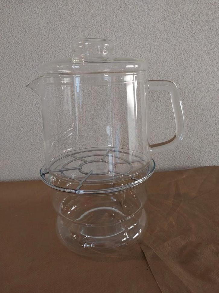 Glazen theepot DE op glazen rechaud/theelichthouder, Antiek en Kunst, Antiek | Glas en Kristal, Ophalen of Verzenden