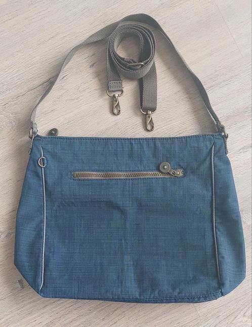 Kipling d.blauwe tas met 2 (kort en lang) bruin hengsel., Sieraden, Tassen en Uiterlijk, Tassen | Schoudertassen, Zo goed als nieuw
