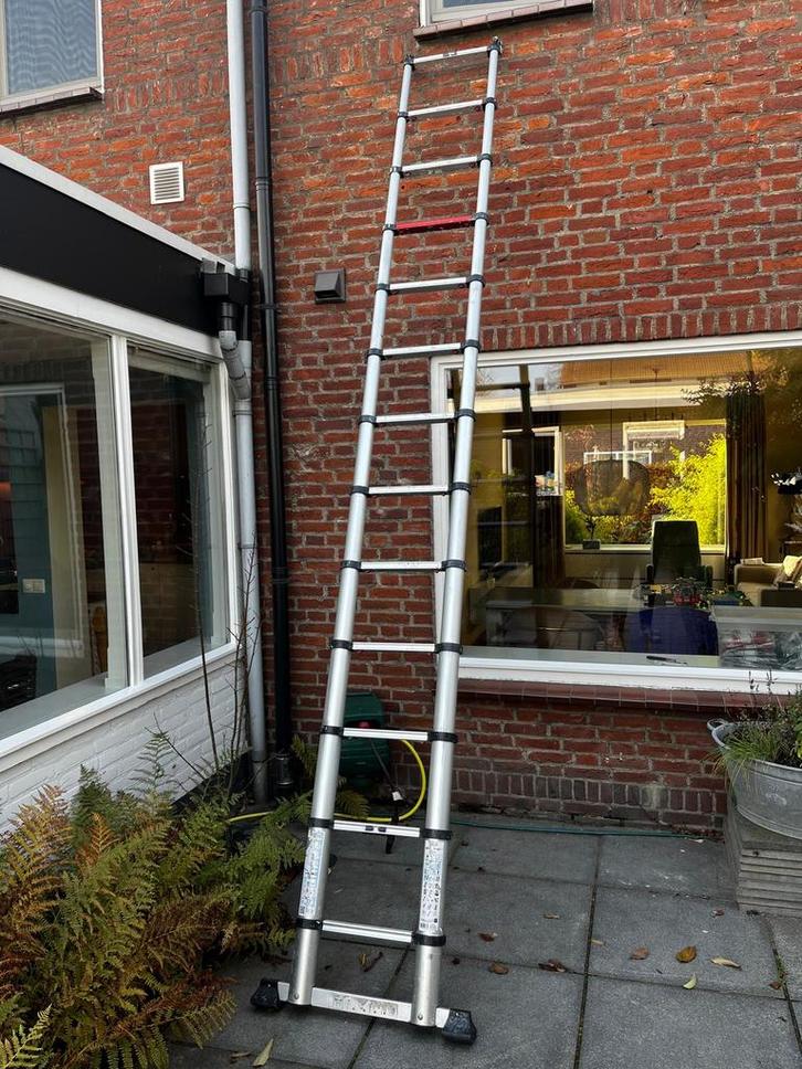 Altrex telescopische ladder., Doe-het-zelf en Verbouw, Ladders en Trappen, Gebruikt, Ladder, 2 tot 4 meter, Opvouwbaar of Inschuifbaar