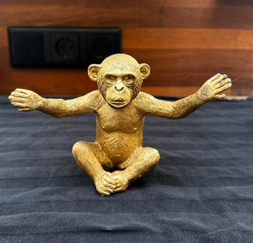 Gouden beeldje aap beschikbaar voor biedingen