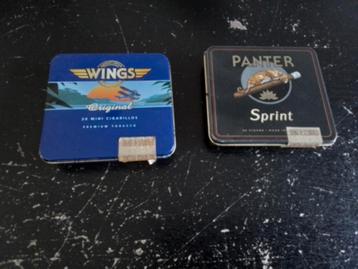 2 erg oude sigarendoosjes Wings en Panter beschikbaar voor biedingen