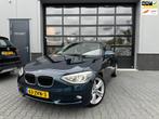 BMW 1-serie 116i Upgrade Edition AUTOMAAT LEER OPEN DAK, Gebruikt, Zwart, 4 cilinders, Blauw
