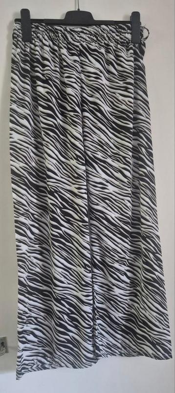 Lange broek merk zebra print beschikbaar voor biedingen