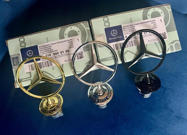 MB STER BLACK CHROME EN GOLD A 21,50 P. STK MET LAUWERKRANS!, Auto-onderdelen, Carrosserie en Plaatwerk, Motorkap, Mercedes-Benz